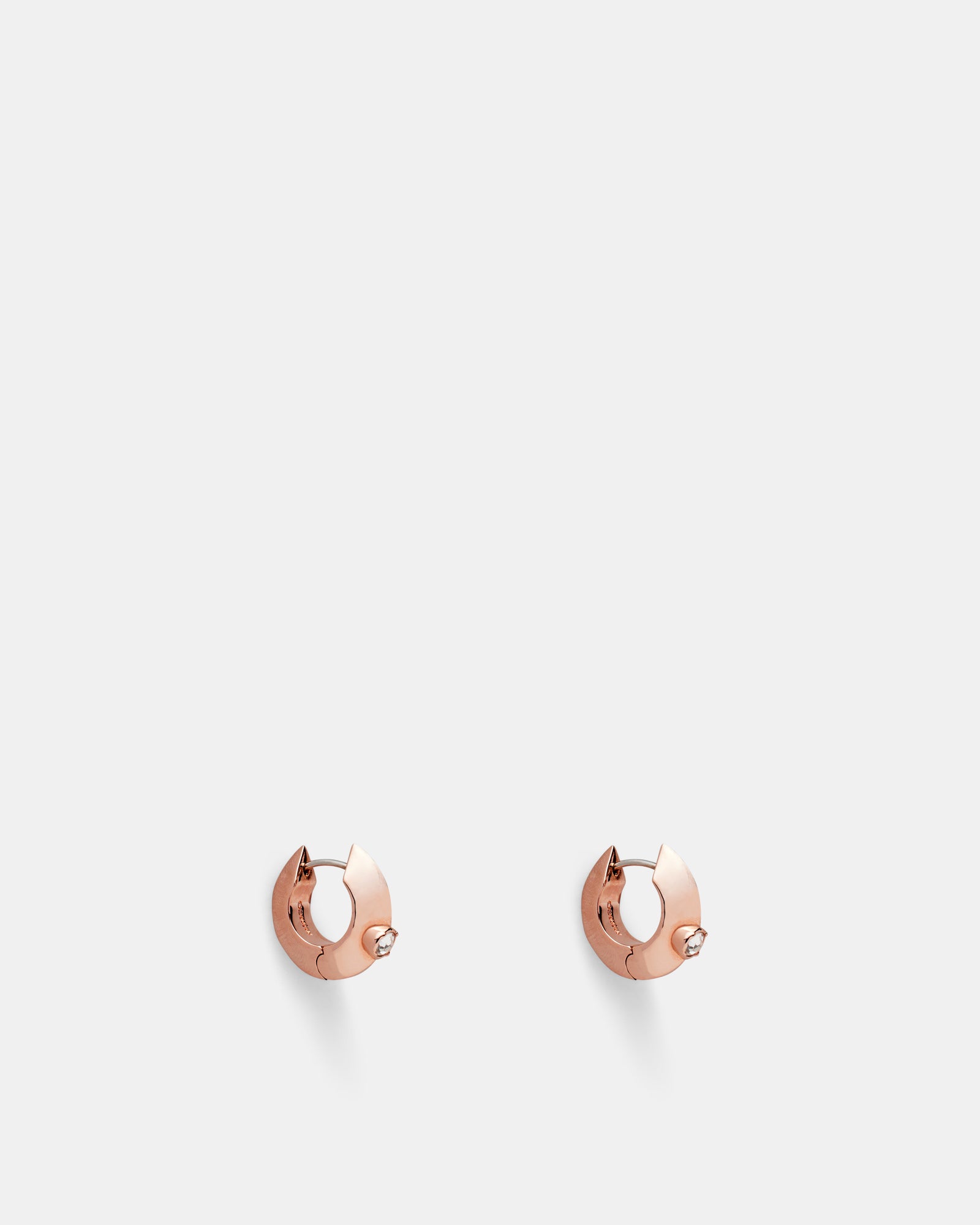 The Edge Huggie Hoop Earrings - Rose Gold
