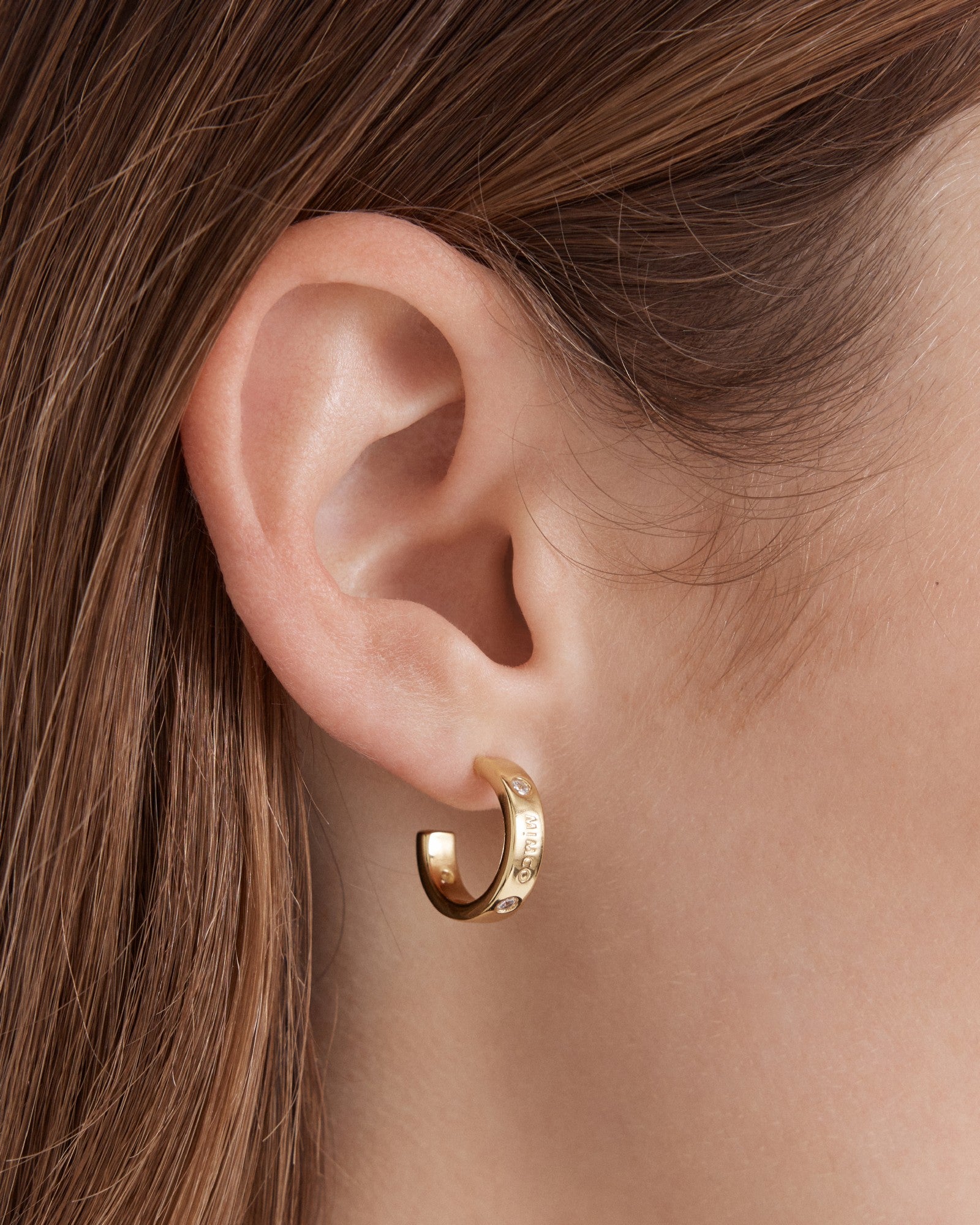 Lucent Small Hoop Earrings - Gold
