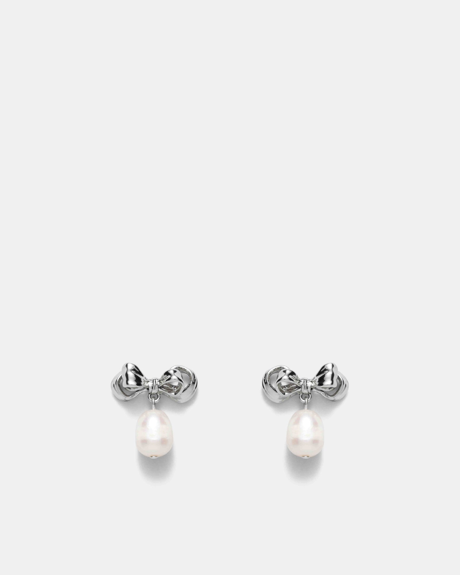 Darcys Bow Pearl Earrings - Silver