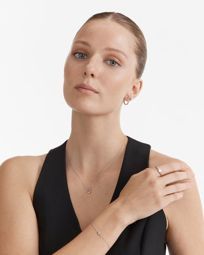 Vela Large Huggie Hoop Earrings - Silver